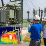 Engineers viewing transformer thermography with an infrared camera and an inset thermal image